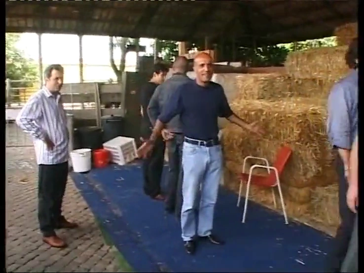 Horny group of men have sex with an innocent blonde in a barn porn video